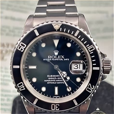 rolex submariner logo|Altro.